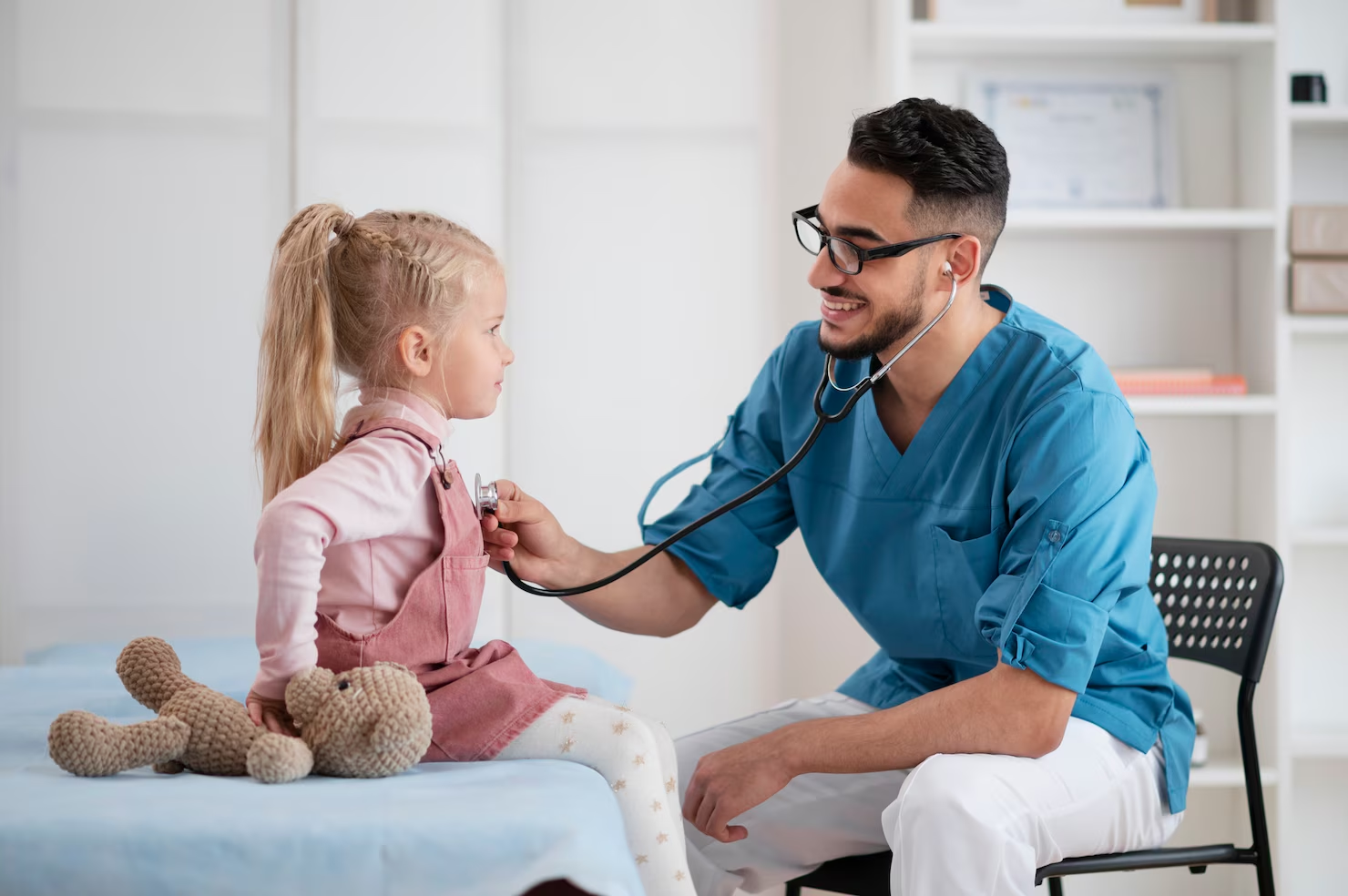 Care professional helping a child