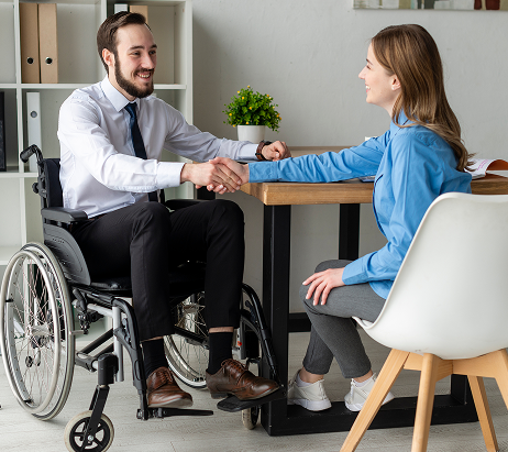 Care professional shaking hands with a client